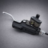 Sur-Ron Ultra OEM brake lever and master cylinder on a gray background